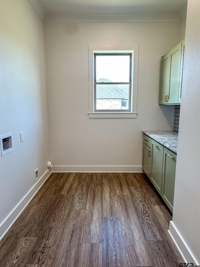 12301 Harlon, Flint, TX 75762 - laundry area with cabinet space, washer hookup, dark wood finished floors, and crown molding
