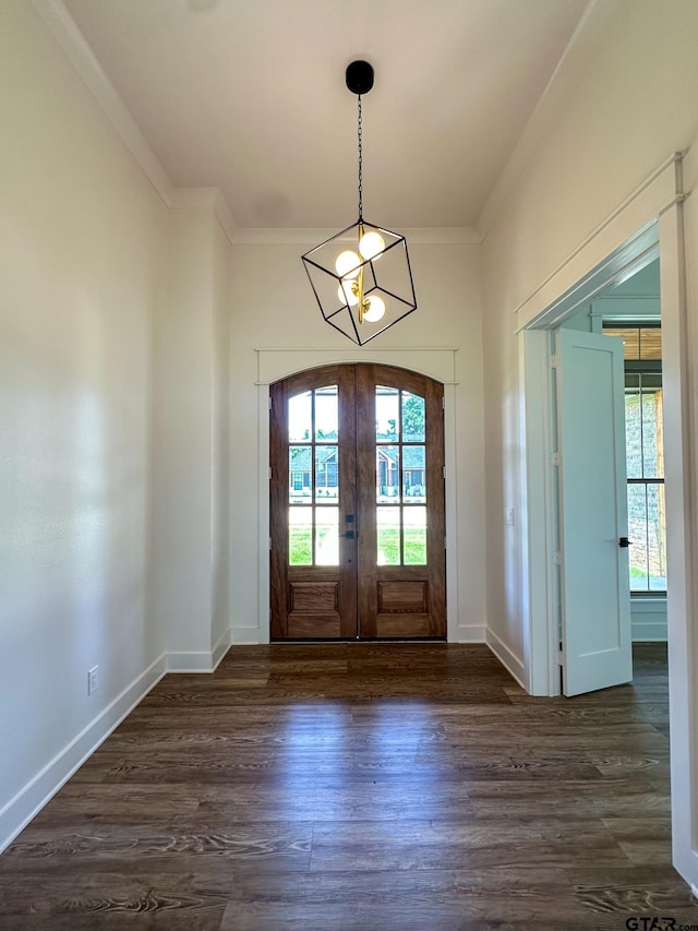 12301 Harlon, Flint, TX 75762 - entrance foyer with french doors, a chandelier, dark wood finished floors, and ornamental molding