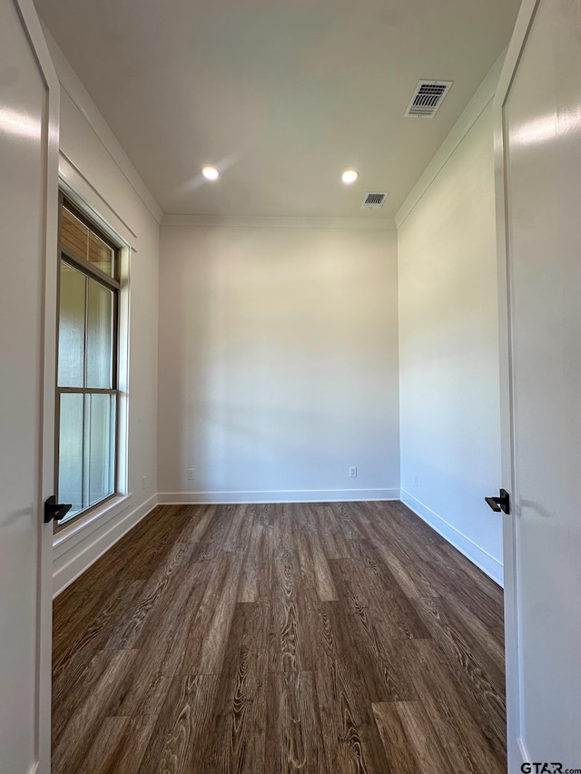 12301 Harlon, Flint, TX 75762 - empty room featuring dark wood-type flooring, crown molding, and recessed lighting