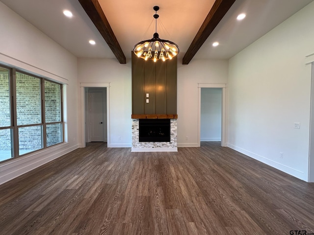 12301 Harlon, Flint, TX 75762 - unfurnished living room featuring beam ceiling, a chandelier, dark wood-style flooring, a fireplace, and recessed lighting