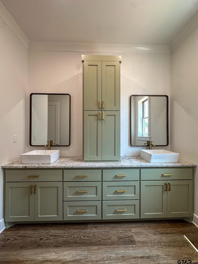 12301 Harlon, Flint, TX 75762 - bathroom with double vanity, wood finished floors, and crown molding