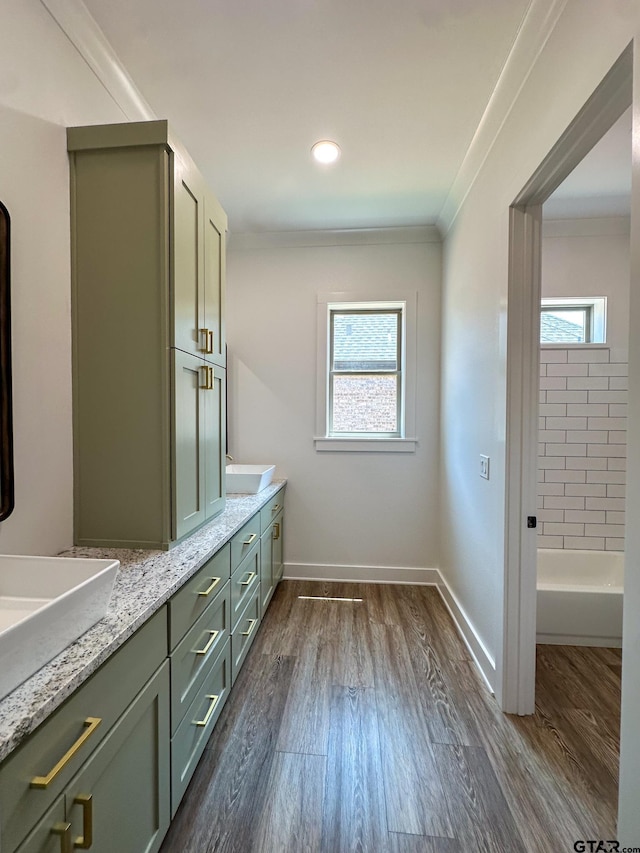 12301 Harlon, Flint, TX 75762 - full bathroom featuring ornamental molding, double vanity, wood finished floors, and a tub to relax in