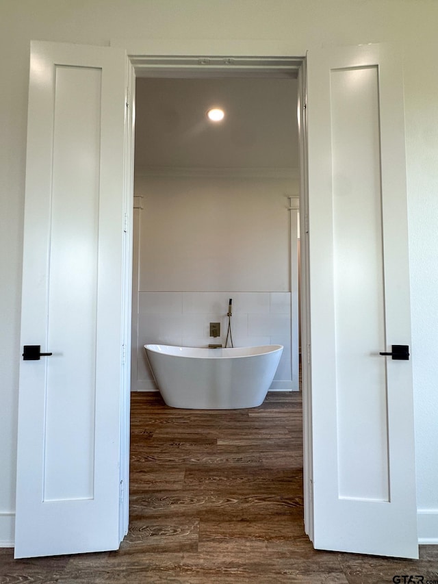 12301 Harlon, Flint, TX 75762 - full bathroom with a freestanding bath, crown molding, wood finished floors, and tile walls