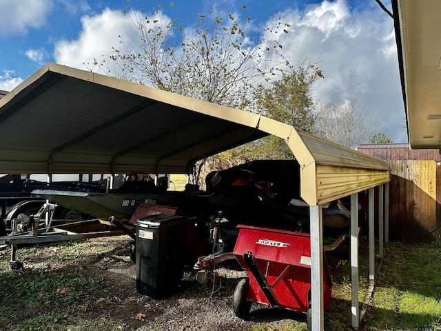 view of parking / parking lot featuring a carport