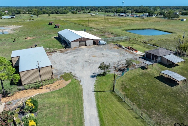 aerial view featuring a rural view and a water view