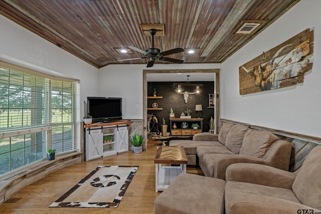 living room with light wood-type flooring, ceiling fan, and wooden ceiling