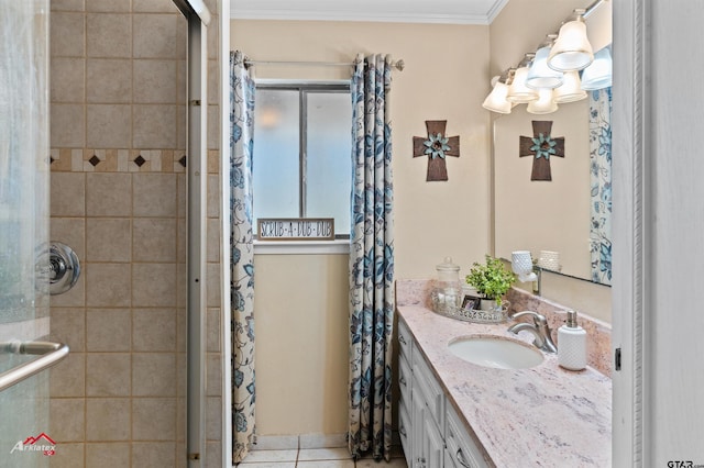 bathroom featuring an enclosed shower, ornamental molding, vanity, and tile patterned floors