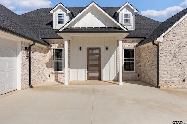 view of front of property with a garage