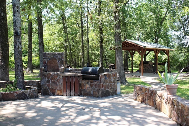 view of patio / terrace featuring a gazebo and grilling area