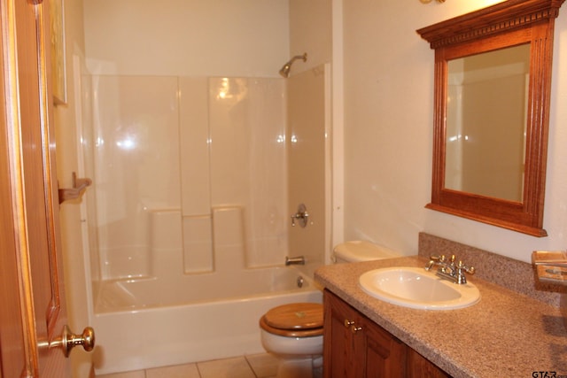 full bathroom with tile patterned flooring, vanity, tub / shower combination, and toilet