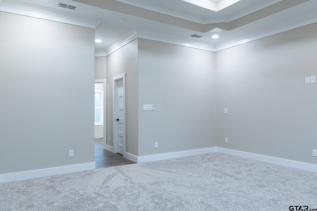 unfurnished room featuring carpet flooring and crown molding