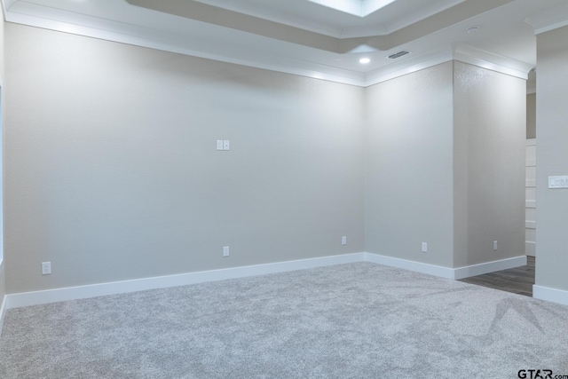 unfurnished room featuring carpet flooring and ornamental molding