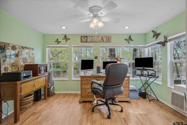 381 Knollwood Ln, Holly Lake Ranch, TX 75765 - office featuring ceiling fan, baseboards, light wood finished floors, and a textured ceiling