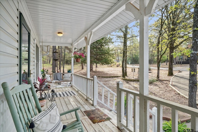 381 Knollwood Ln, Holly Lake Ranch, TX 75765 - wooden deck with a porch