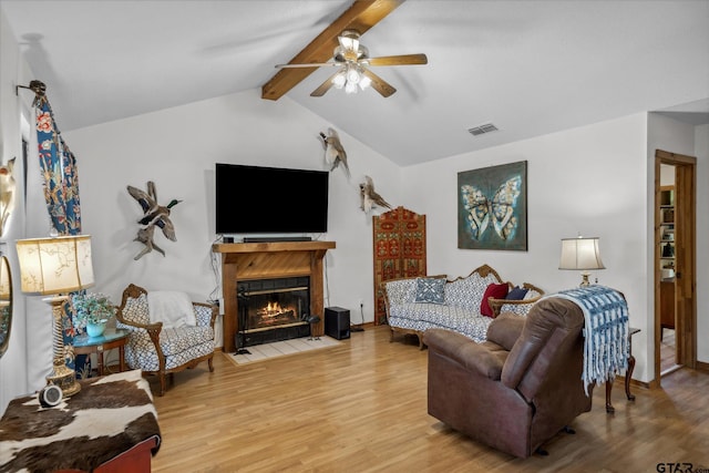 381 Knollwood Ln, Holly Lake Ranch, TX 75765 - living room featuring vaulted ceiling with beams, visible vents, wood finished floors, and ceiling fan