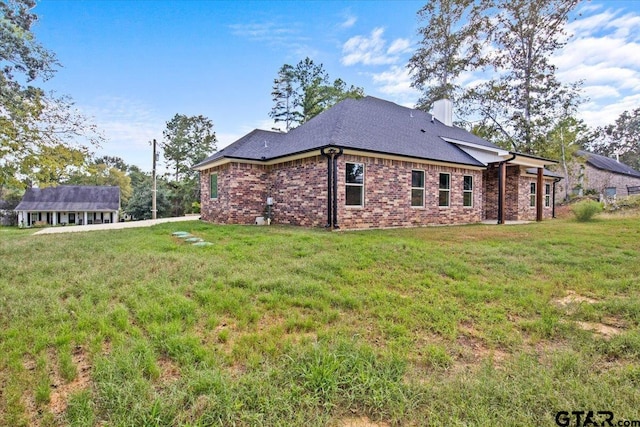 exterior space featuring a yard