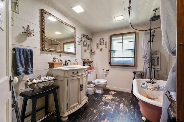 bathroom with a tub to relax in, wood walls, a bidet, wood-type flooring, and toilet