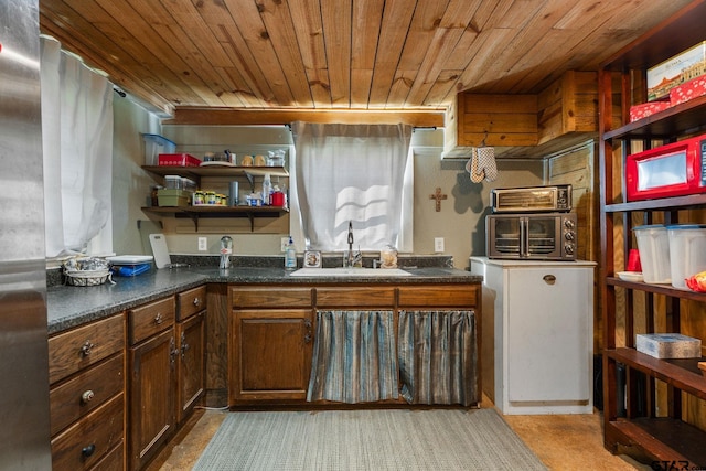 kitchen with wood ceiling and sink