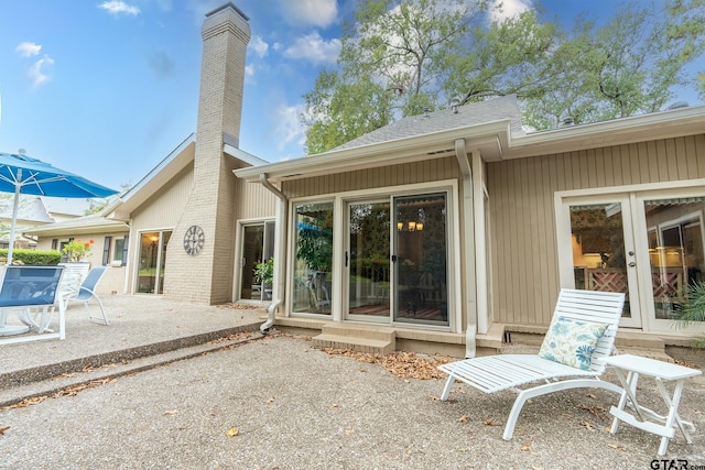 back of house featuring french doors and a patio area