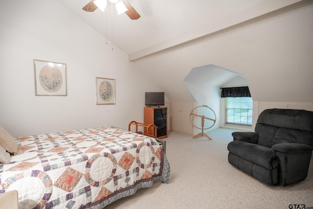 carpeted bedroom featuring ceiling fan and lofted ceiling with beams