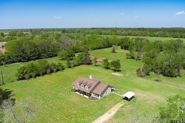 birds eye view of property with a rural view