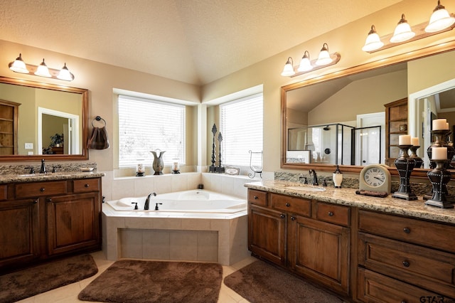 bathroom featuring plus walk in shower, tile patterned floors, a textured ceiling, and lofted ceiling