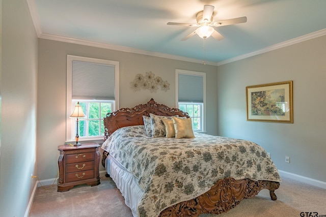 bedroom featuring light colored carpet, ceiling fan, and ornamental molding