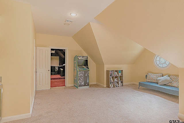 bonus room featuring carpet flooring and lofted ceiling