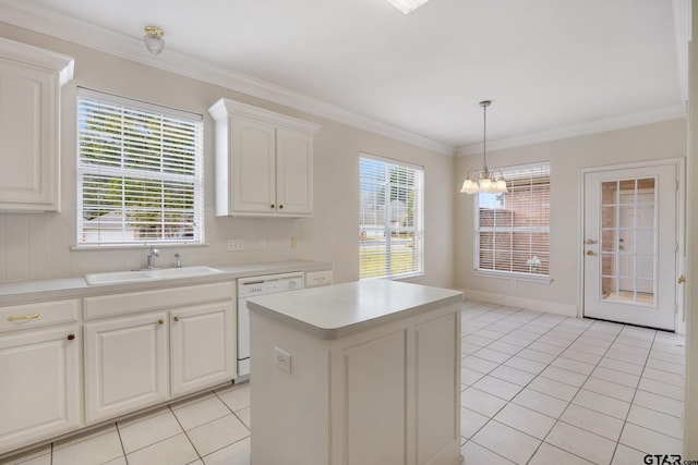 kitchen with white cabinetry, sink, a healthy amount of sunlight, and dishwasher