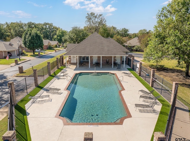 view of swimming pool featuring a patio