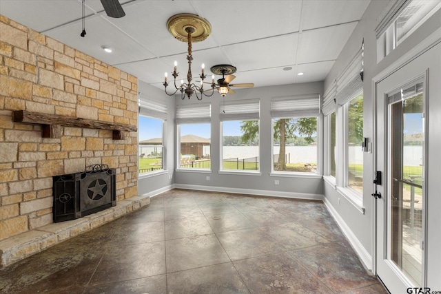 89 Eagle Cv, Mount Vernon, TX 75457 - unfurnished sunroom featuring healthy amount of natural light, baseboards, and a chandelier