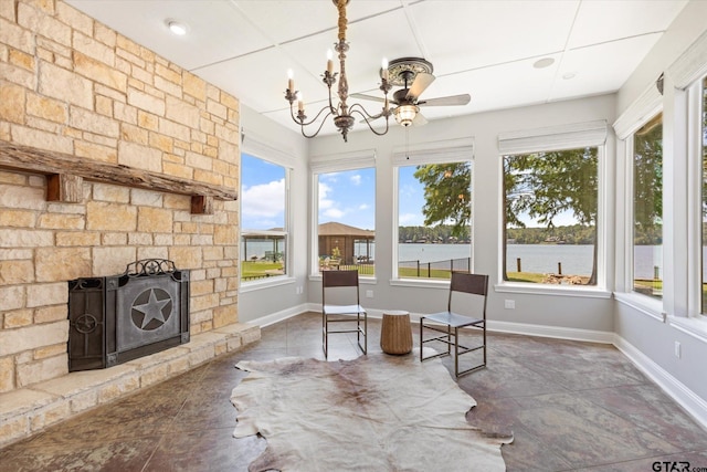 89 Eagle Cv, Mount Vernon, TX 75457 - sunroom with baseboards and a chandelier