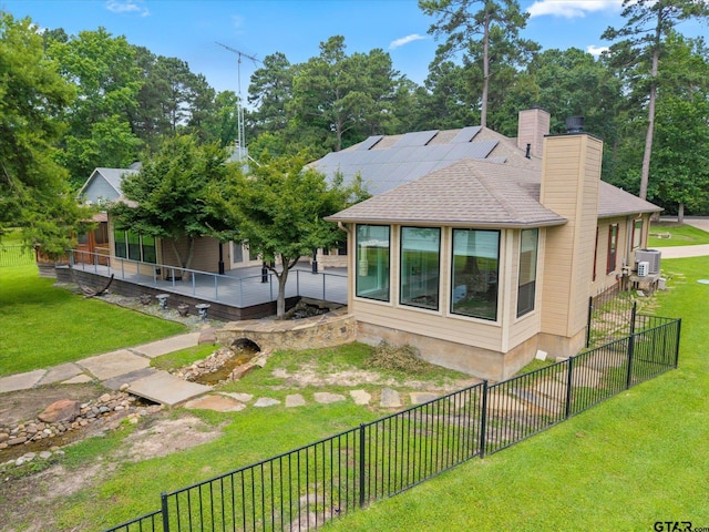 89 Eagle Cv, Mount Vernon, TX 75457 - rear view of property with a chimney and roof with shingles