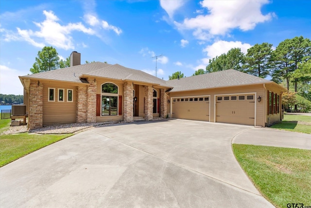 89 Eagle Cv, Mount Vernon, TX 75457 - ranch-style home with a garage, a chimney, concrete driveway, and a shingled roof
