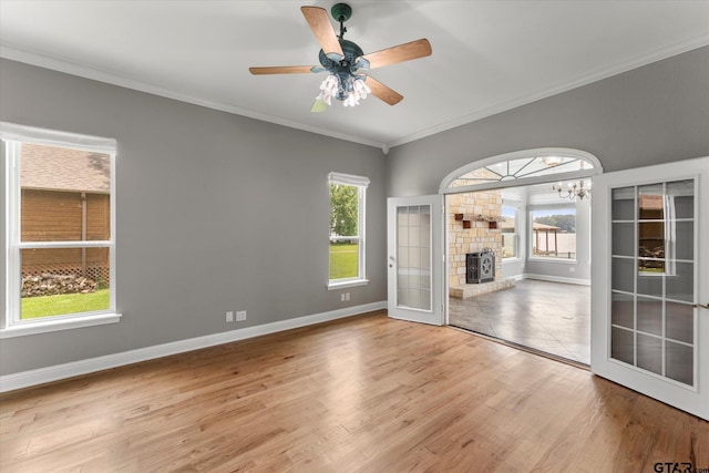 89 Eagle Cv, Mount Vernon, TX 75457 - spare room featuring healthy amount of natural light, crown molding, wood finished floors, and baseboards