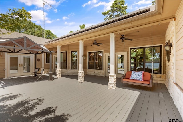 wooden deck with ceiling fan