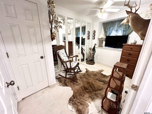 bedroom featuring ceiling fan and crown molding