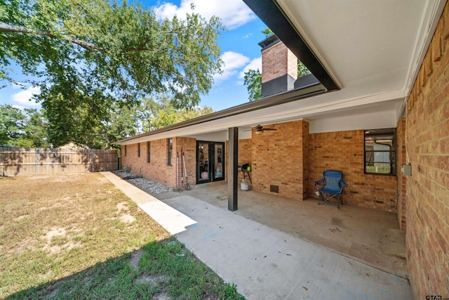 exterior space with a patio area and ceiling fan