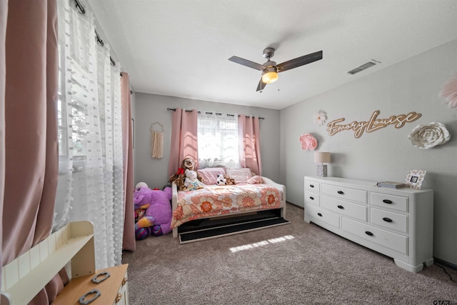 carpeted bedroom with ceiling fan