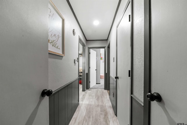 hallway featuring light hardwood / wood-style flooring