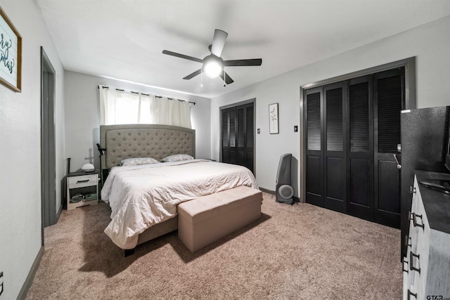 bedroom with ceiling fan and carpet