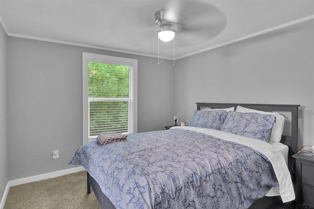 bedroom with carpet, ceiling fan, ornamental molding, and baseboards