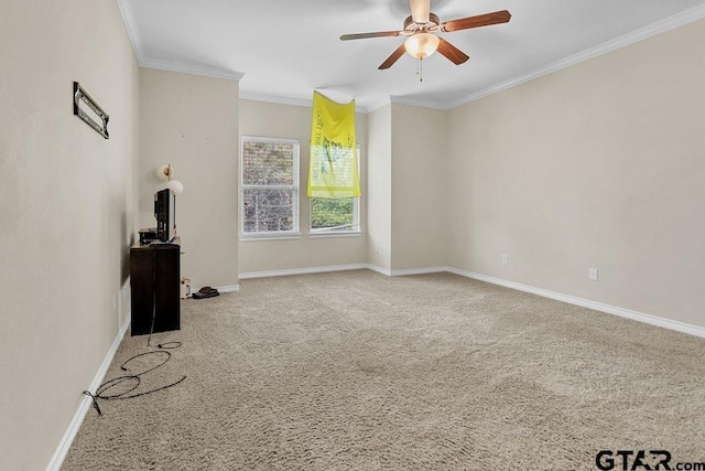 unfurnished living room featuring ceiling fan, carpet floors, and ornamental molding