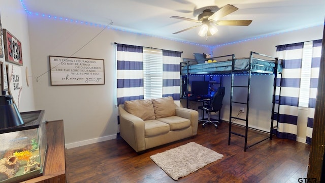 bedroom featuring dark wood-type flooring and ceiling fan