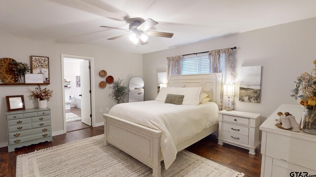 9497 Fm 804, Larue, TX 75770 - bedroom with wood finished floors, connected bathroom, ceiling fan, and baseboards