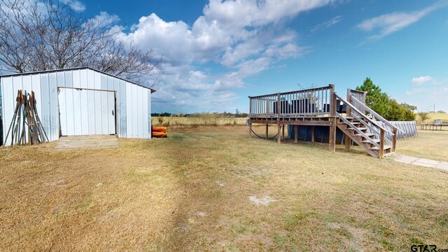9497 Fm 804, Larue, TX 75770 - view of grassy yard with a deck, an outbuilding, and stairway