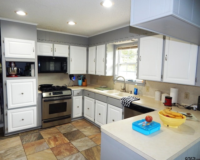 kitchen with white cabinetry, stainless steel appliances, ornamental molding, and sink