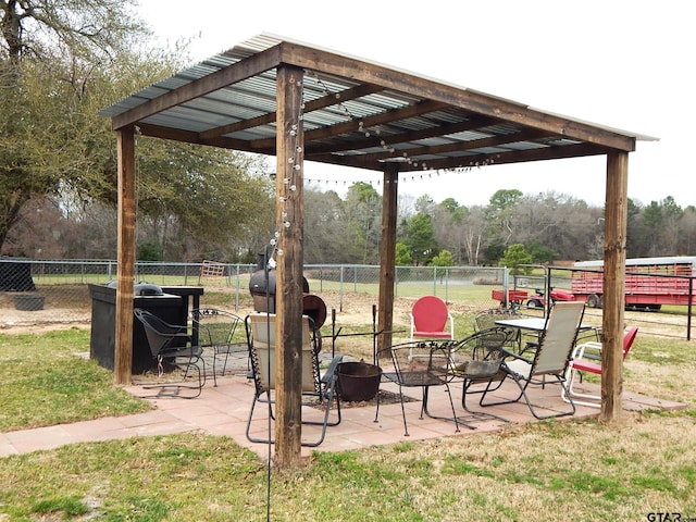 exterior space with a pergola, a yard, and a patio area