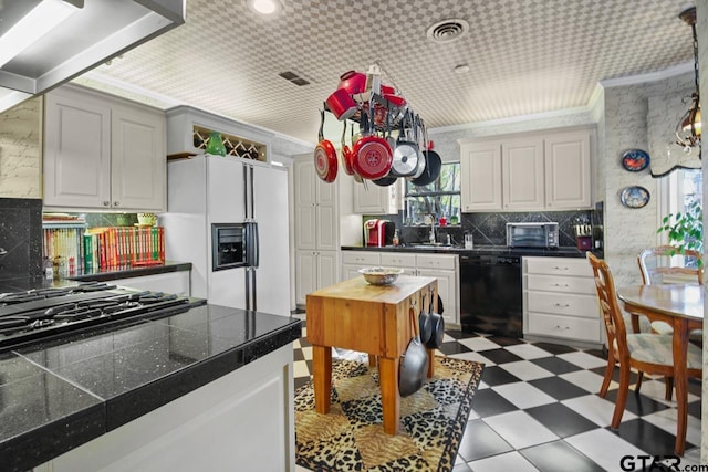 kitchen with decorative backsplash, ornamental molding, white cabinets, black dishwasher, and white fridge with ice dispenser