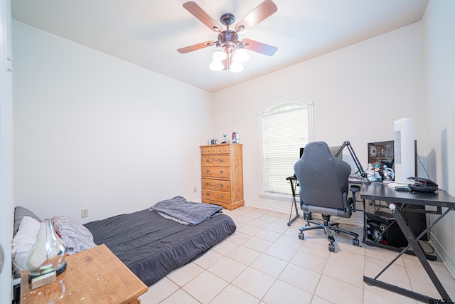 bedroom featuring ceiling fan and light tile patterned floors